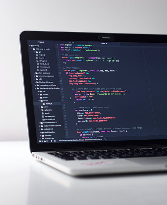 Laptop Open, Lines of Codes on Screen - Mass Reach